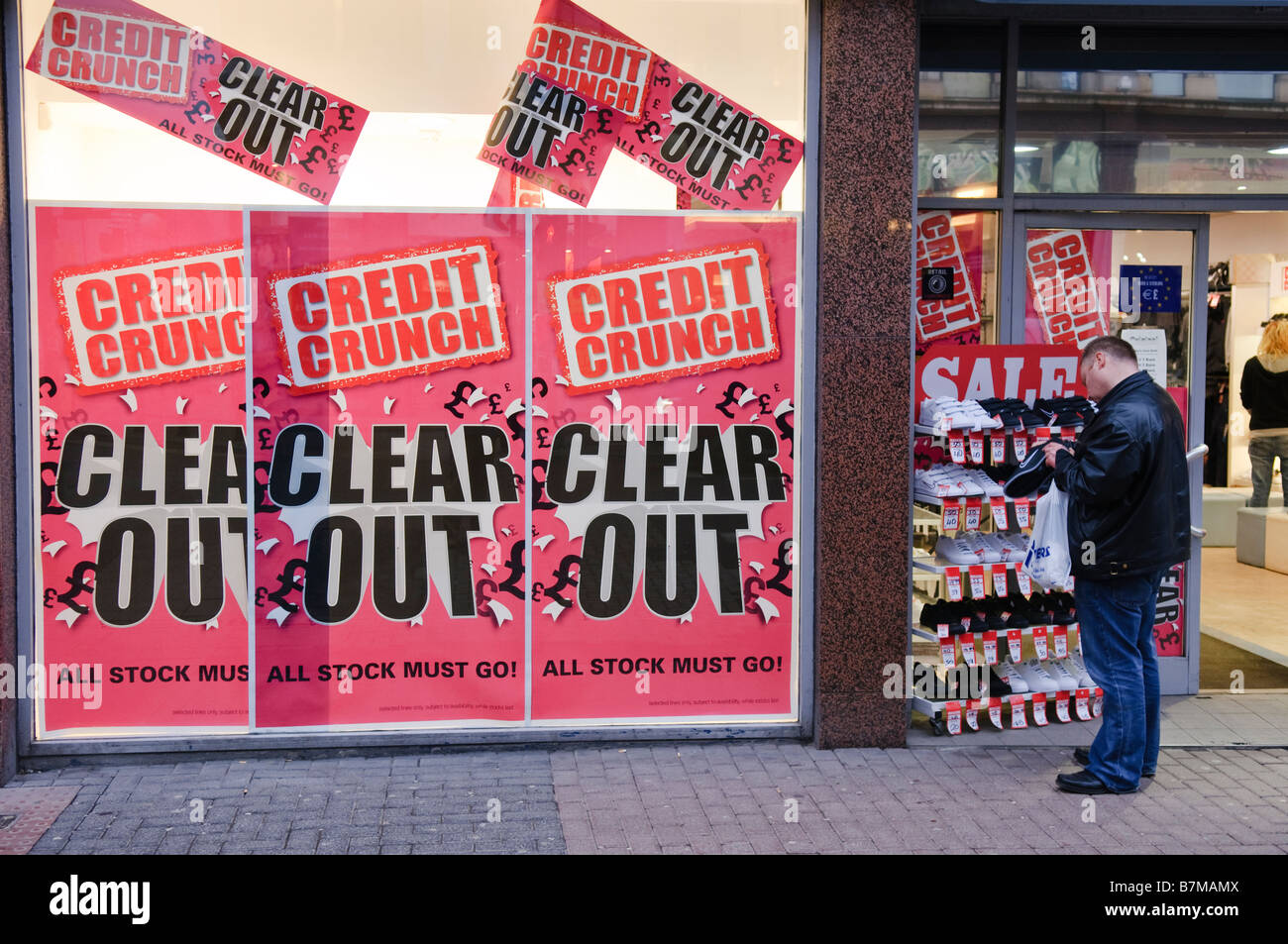 Warehouse clearance sale red sign Stock Photo - Alamy