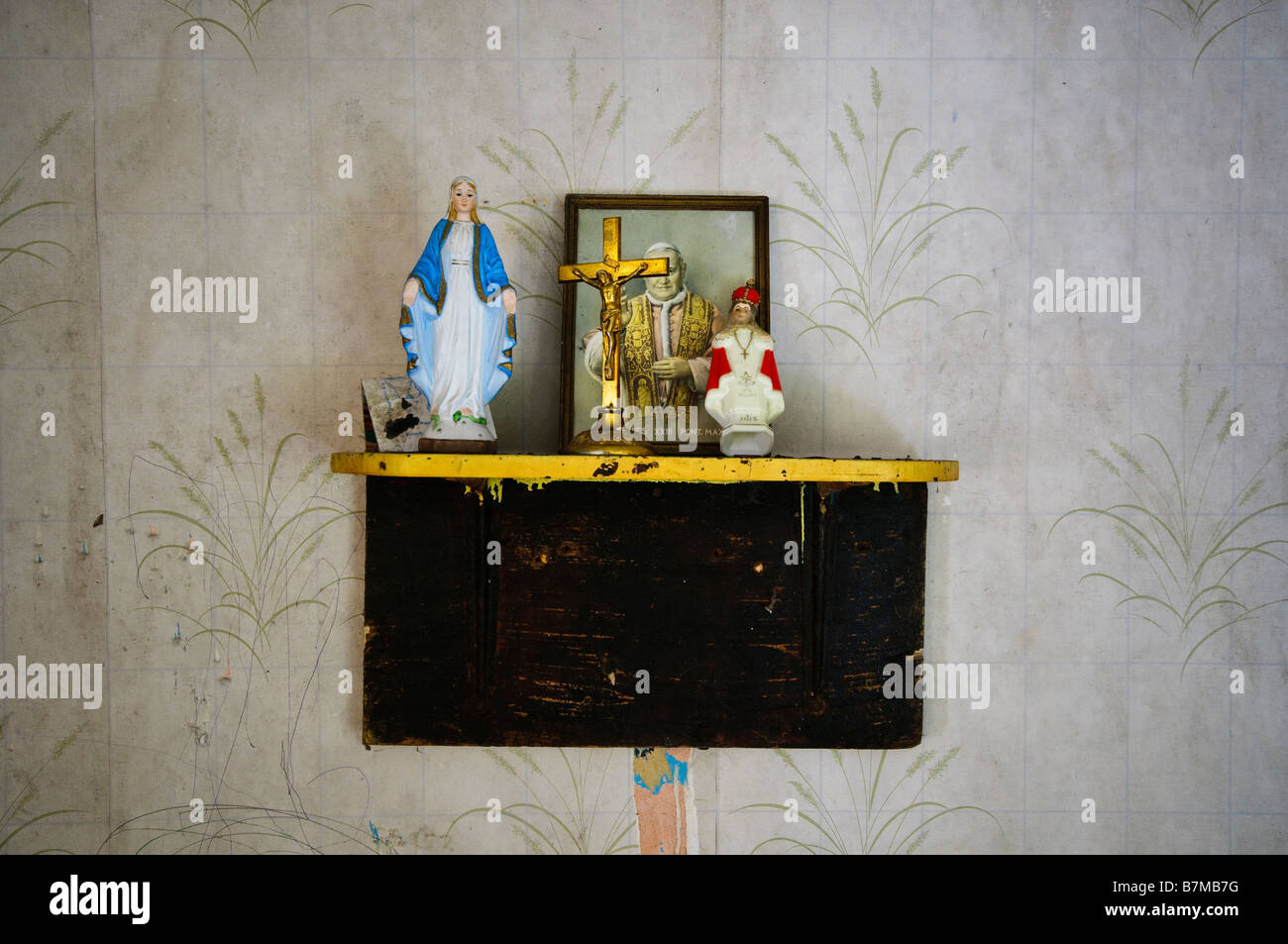 Roman Catholic religious objects on a shelf in an old Irish cottage. Stock Photo