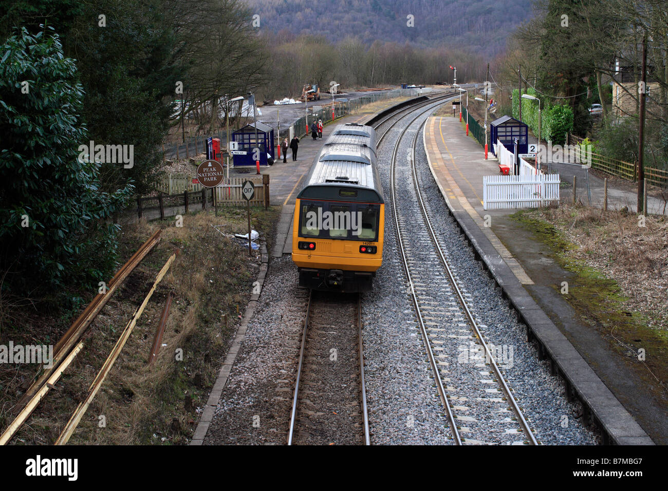 Hope Valley line commuter train stopping at Grindleford Station, in Derbyshire, England UK, rural pacer train Stock Photo