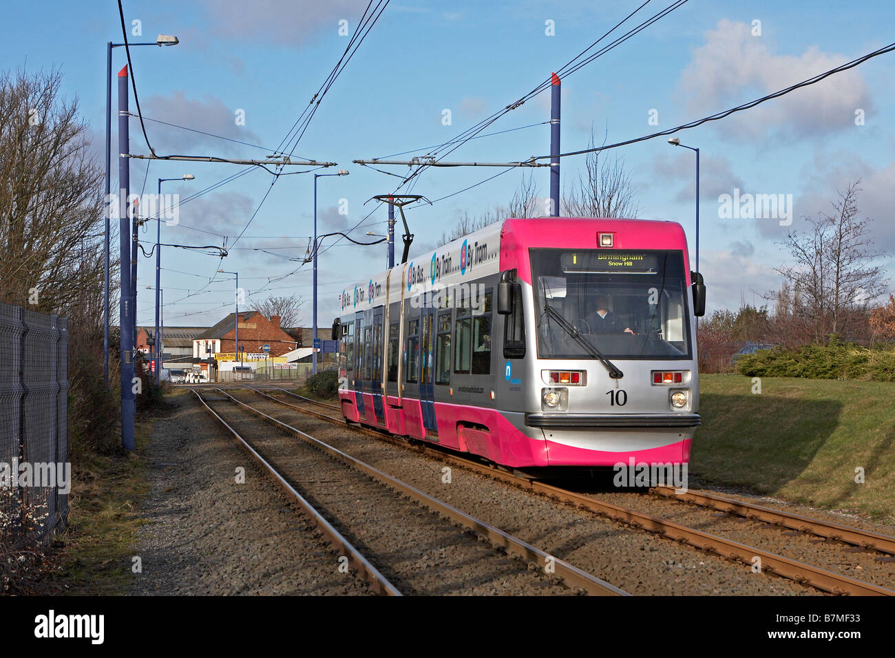 Tram number 10 heads into Priestfield Station Wolverhampton with a Wolverhampton St Georges Birmingham Snow Hill service on 23 0 Stock Photo