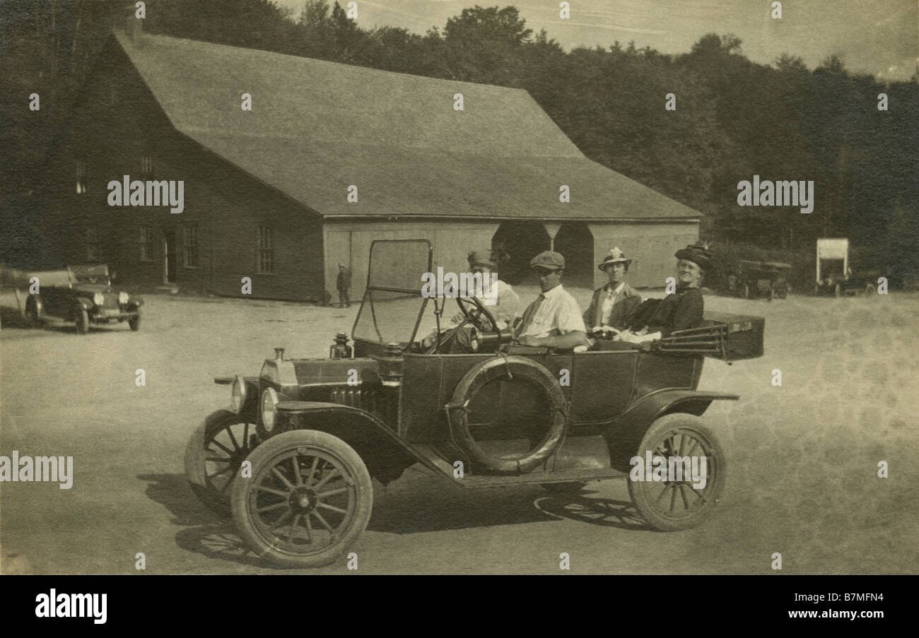 Circa 1910 Ford Model T with a family on a ride in the country. Stock Photo