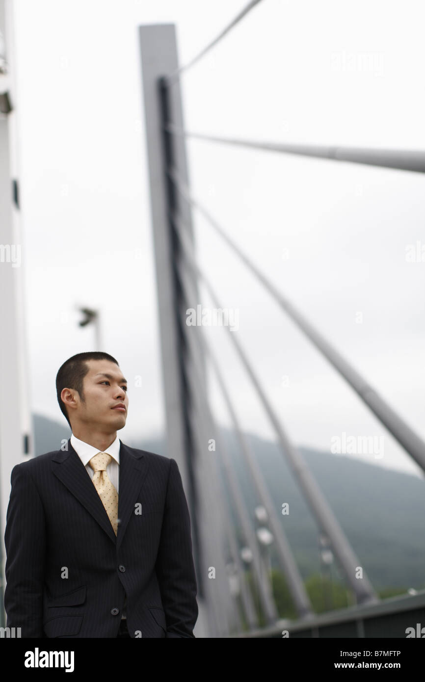 Man walking on bridge hi-res stock photography and images - Alamy
