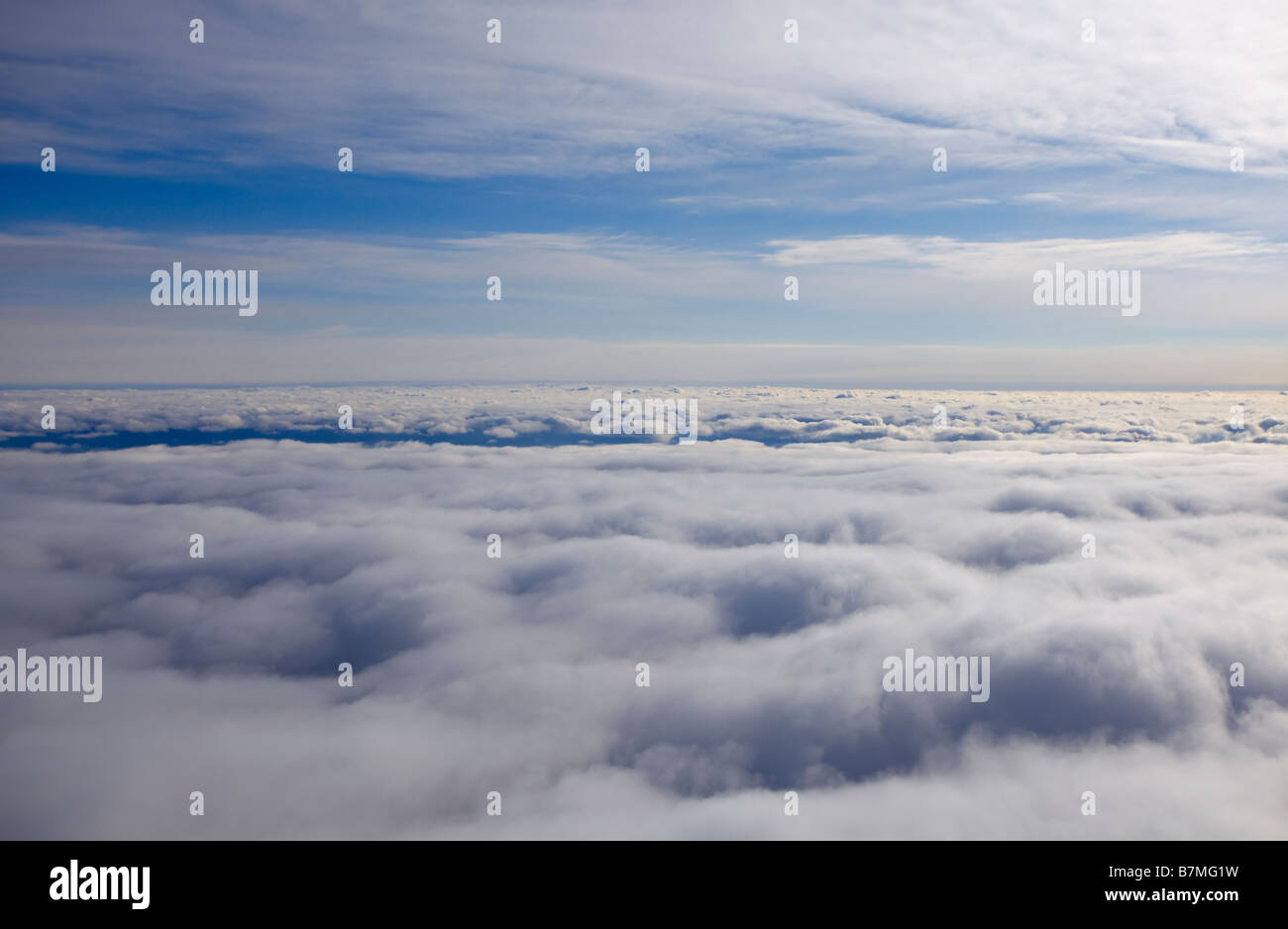 White fluffy clouds and blue sky Stock Photo - Alamy