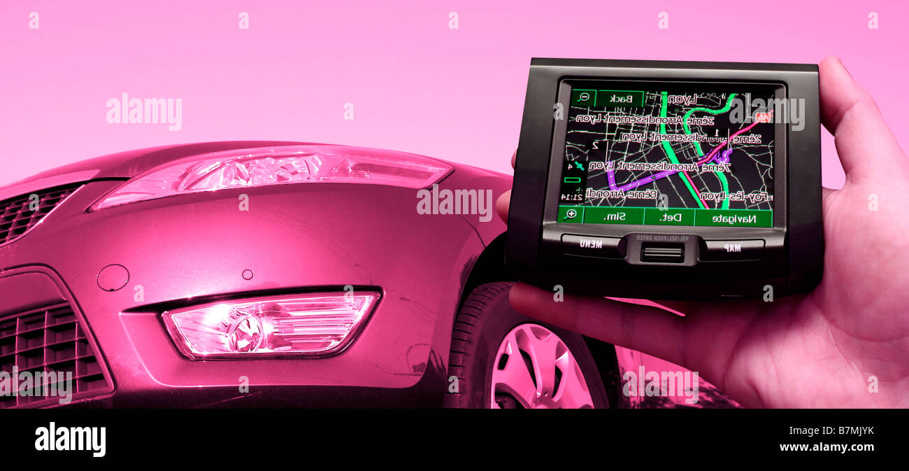 GPS Vehicle navigation system in a man hand Stock Photo Alamy
