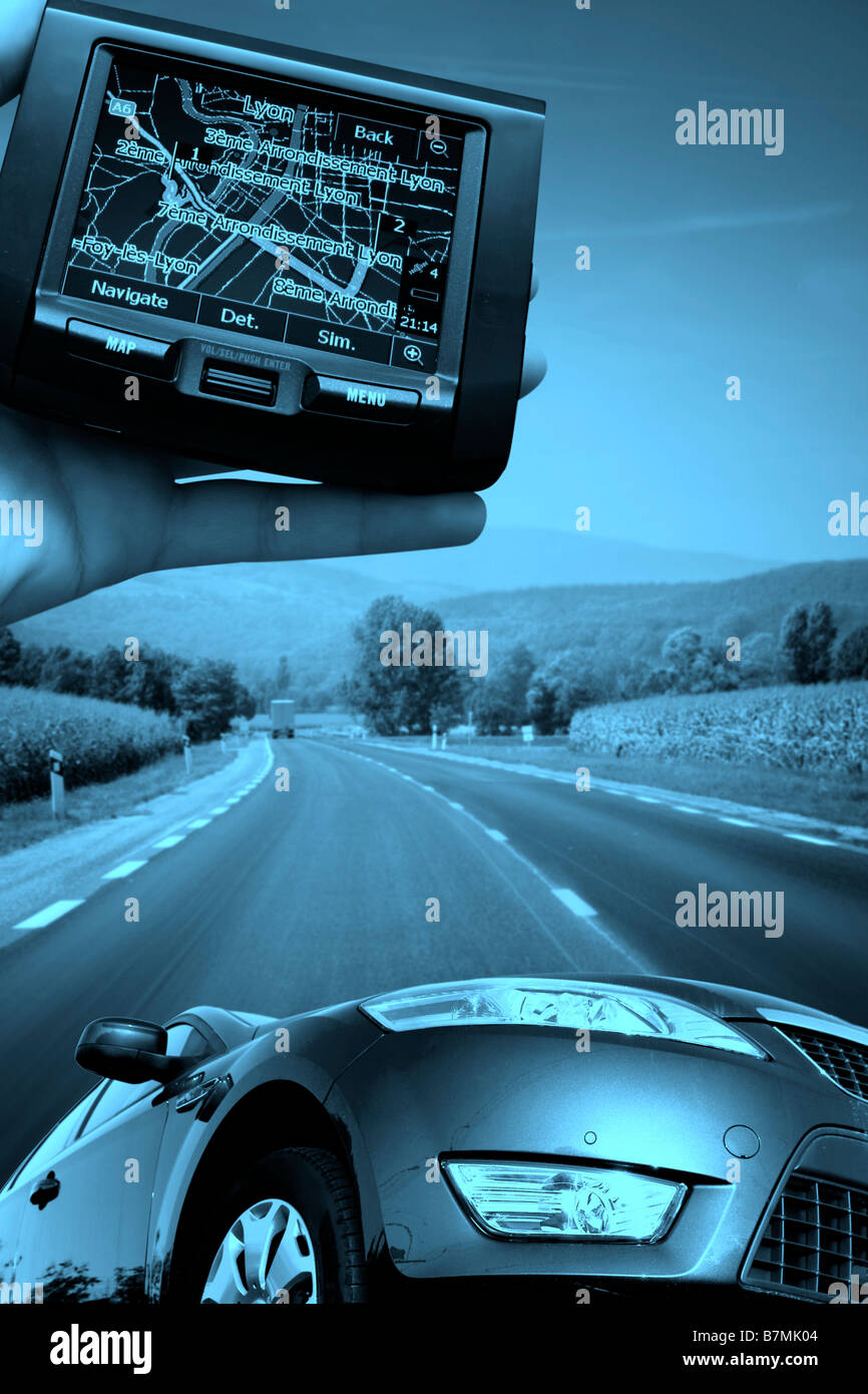 GPS Vehicle navigation system in a man hand Stock Photo Alamy
