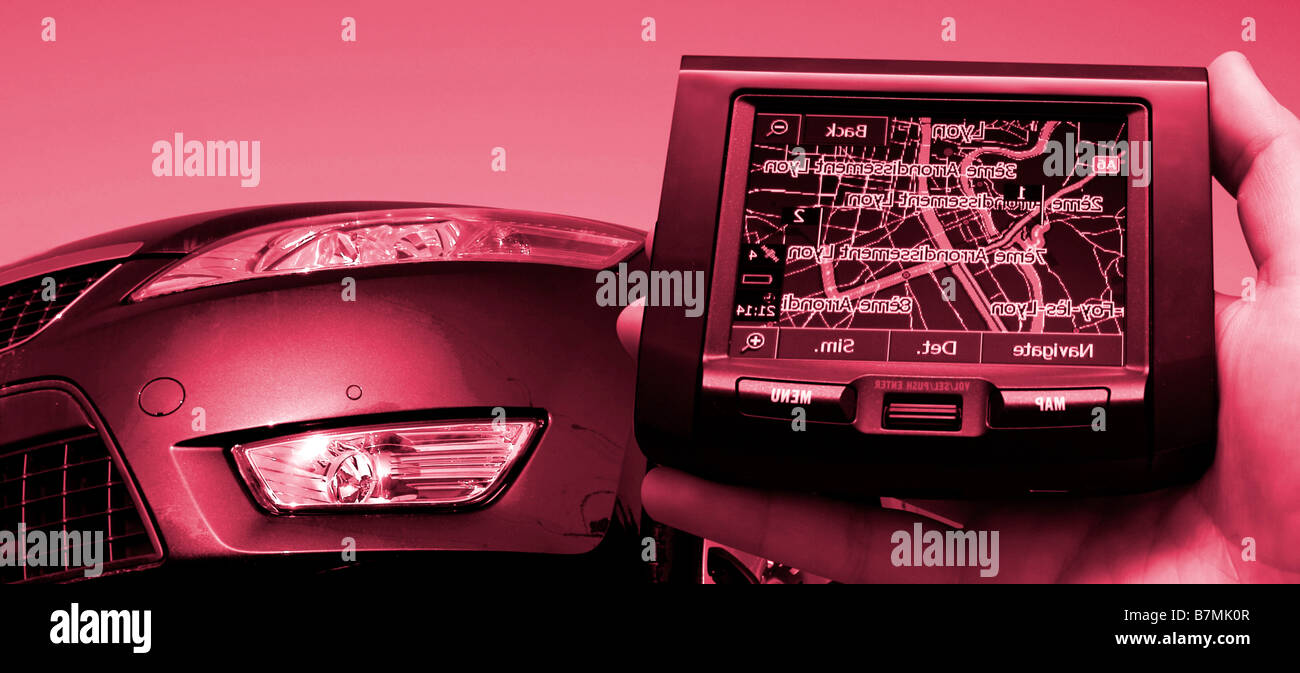 GPS Vehicle navigation system in a man hand Stock Photo