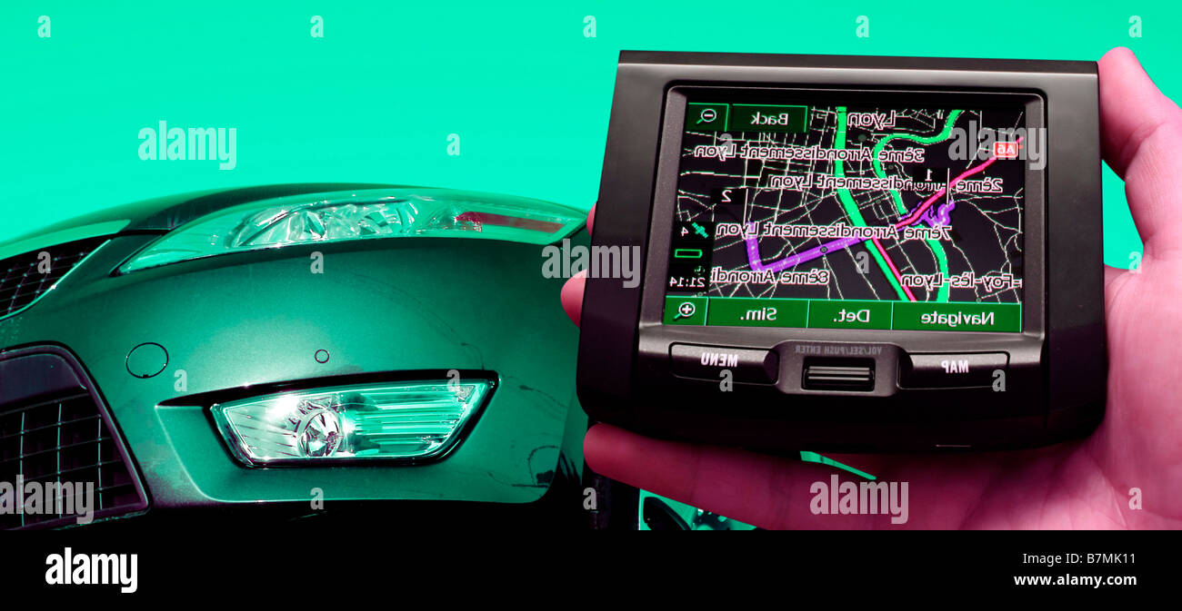 GPS Vehicle navigation system in a man hand Stock Photo Alamy