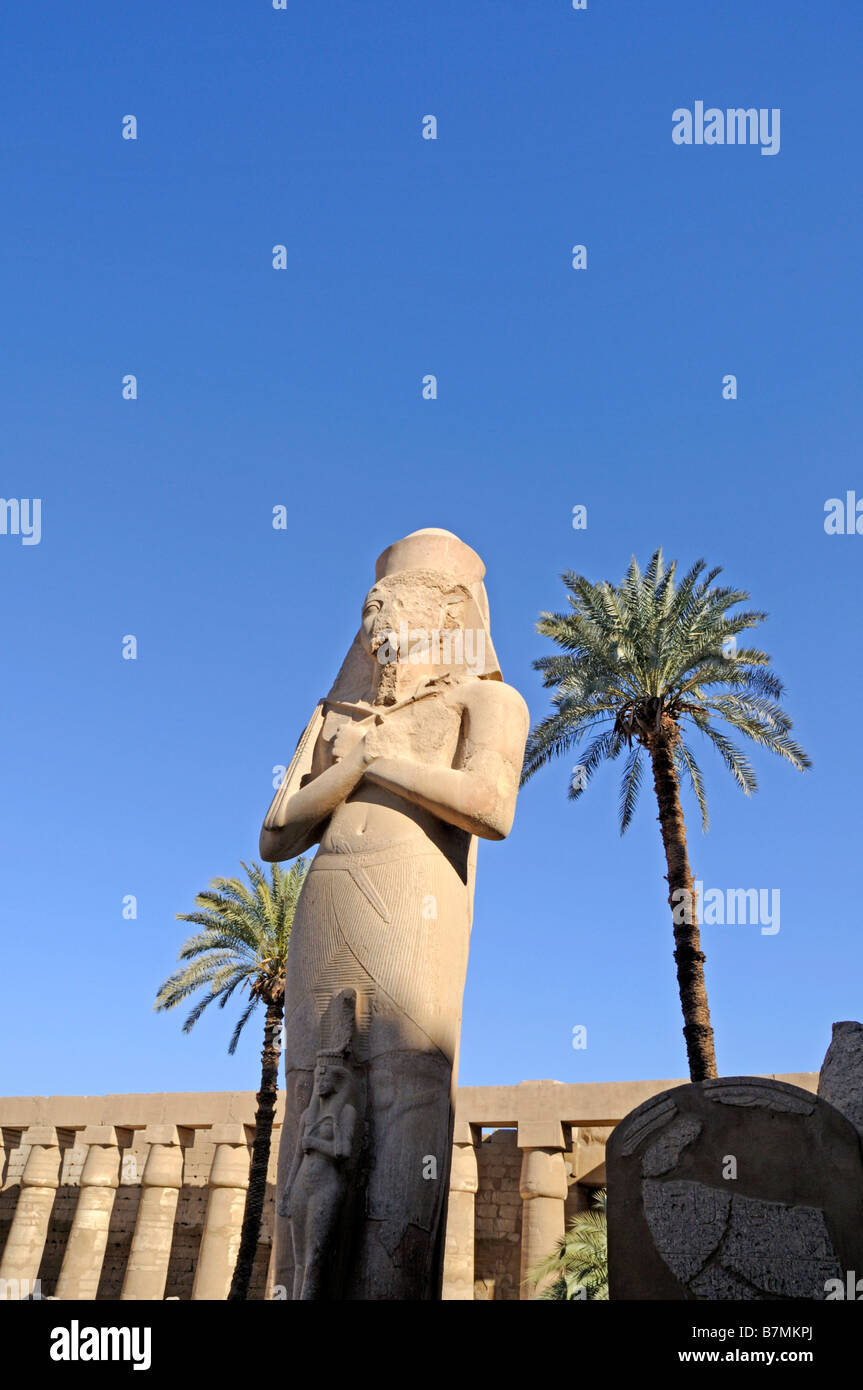 Statue of Pharaoh and Queen at the Temple of Karnak in Egypt Stock ...