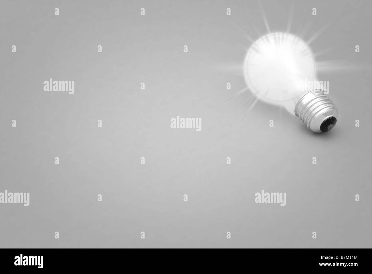 Background with lit lightbulb on yellow Stock Photo - Alamy
