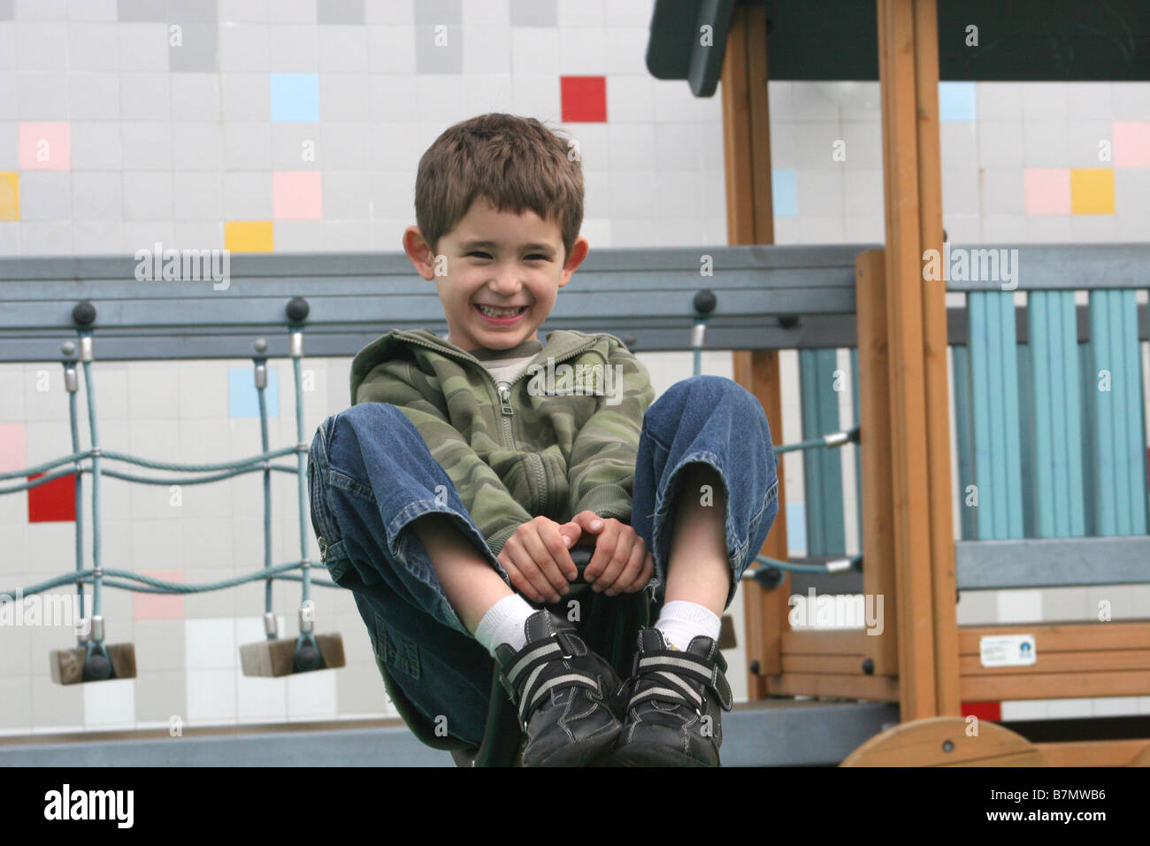 A boy playing at a playground in Portugal Stock Photo - Alamy