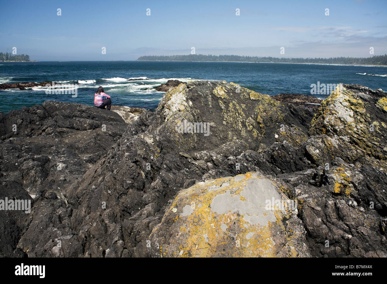 BRITISH COLUMBIA - Enjoying the view of Half Moon Bay in Pacific Rim National Park Reserve. Stock Photo