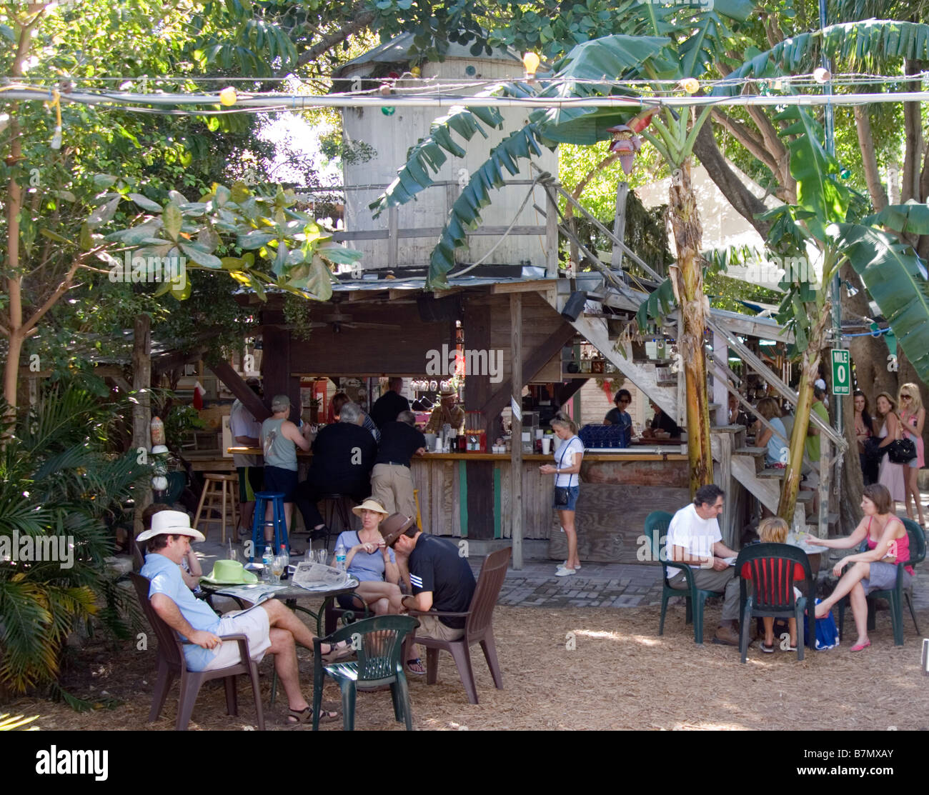 relaxing in the blue heaven restaurant key west Stock Photo Alamy