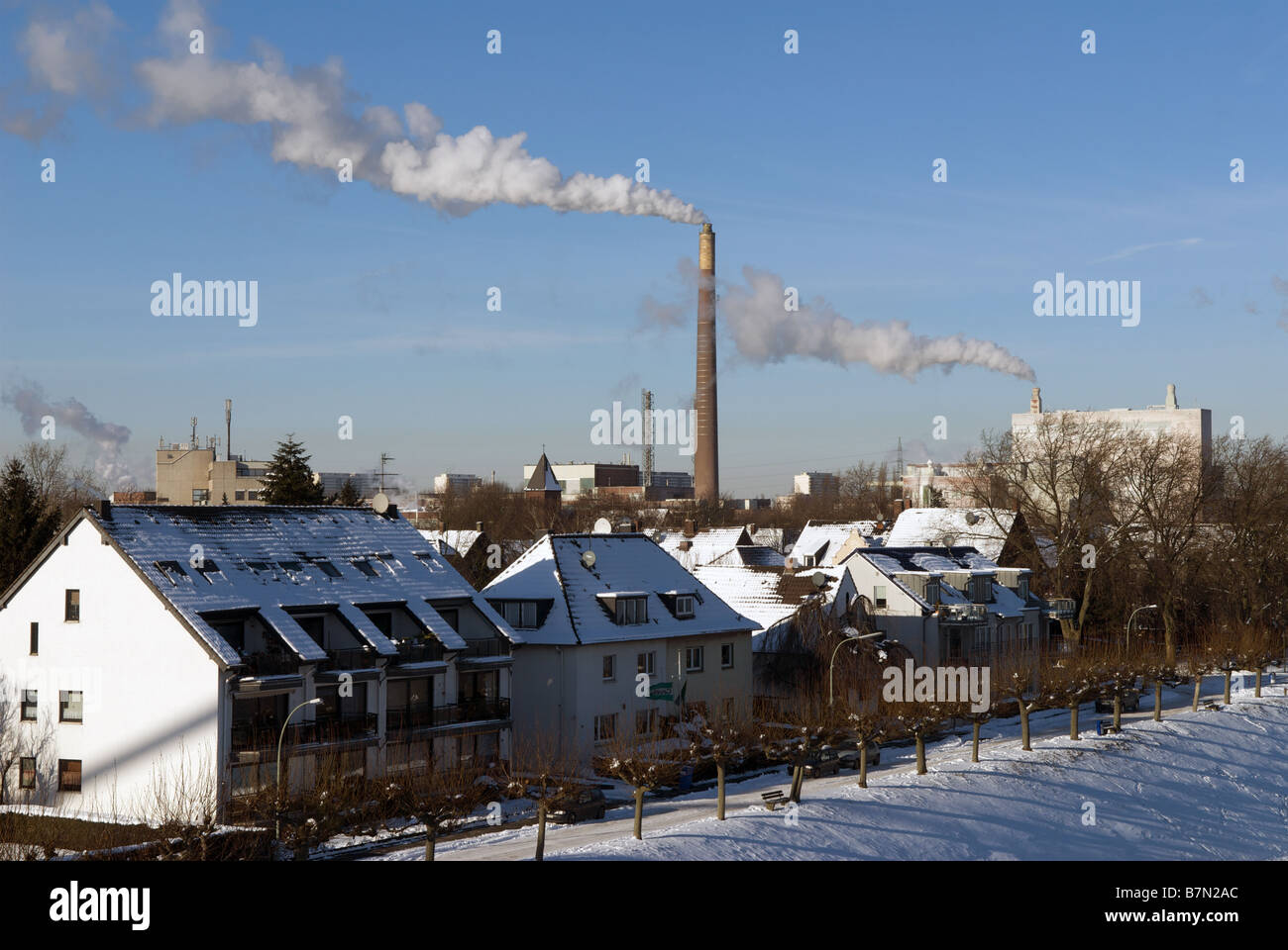 Residential properties close to chemical plant, Germany. Stock Photo