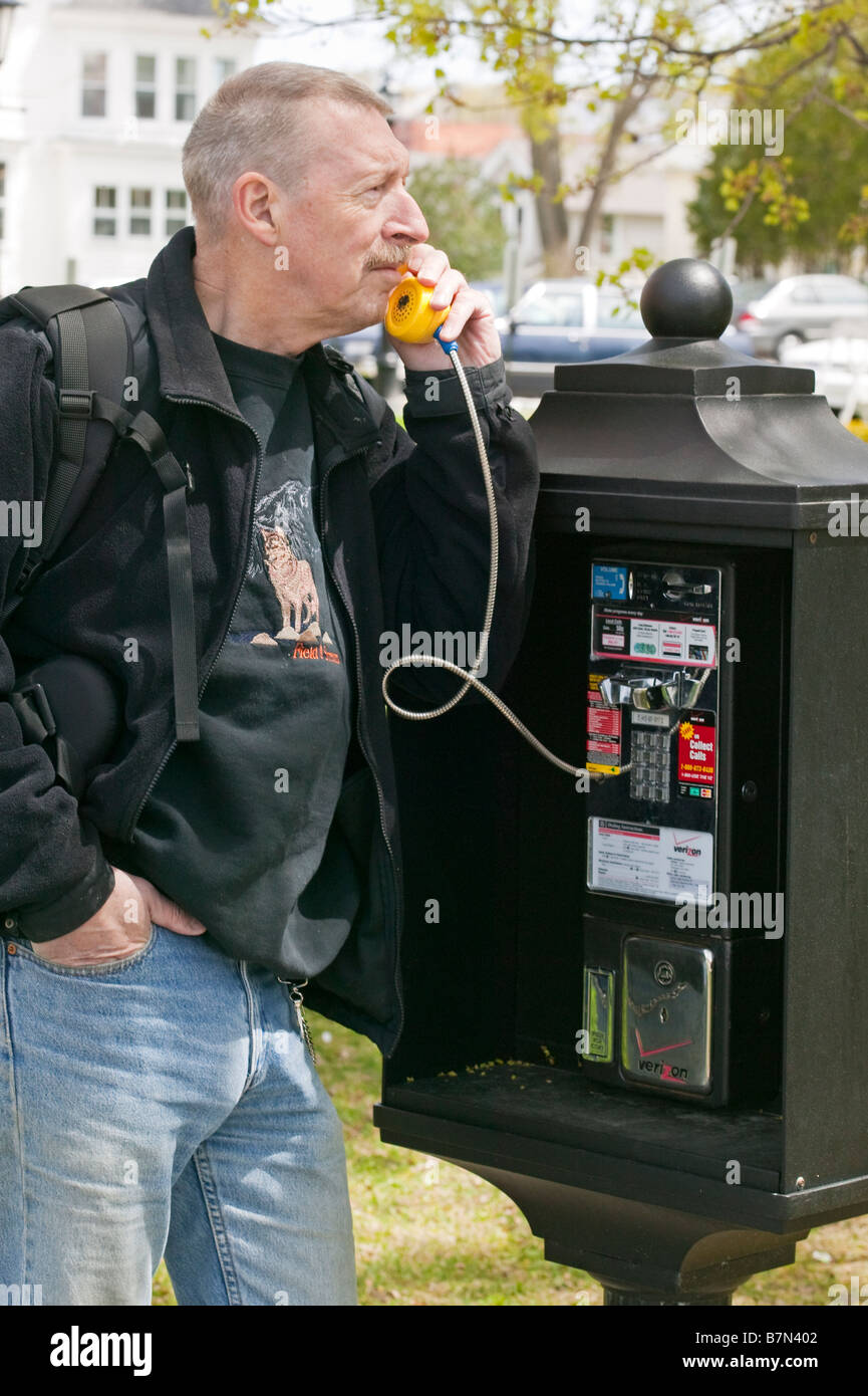 Man talking on payphone hi-res stock photography and images - Alamy