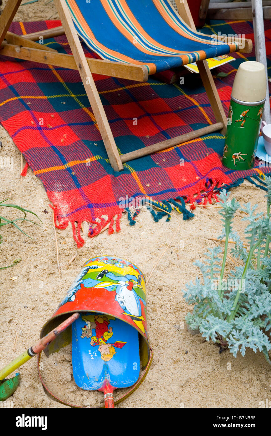 Detail of a bucket and spade on a sandy beach in Great Britain Stock Photo