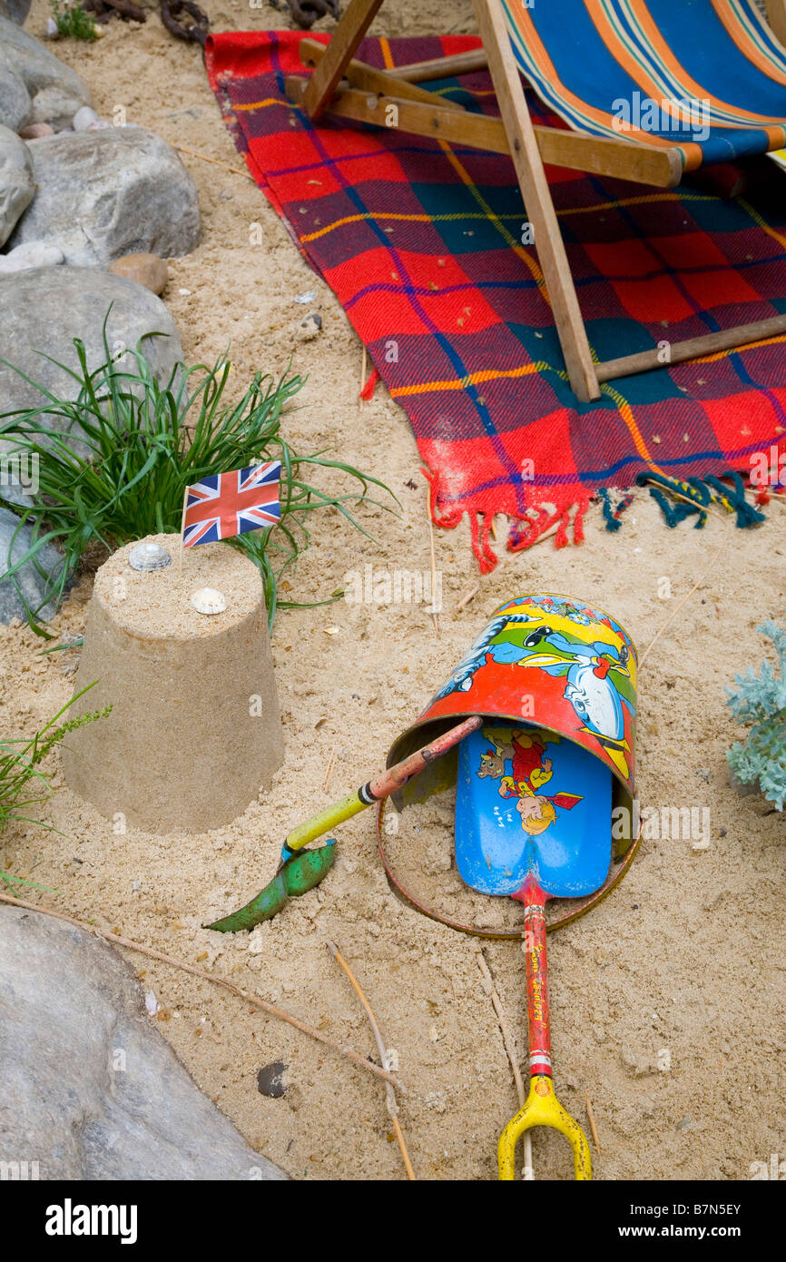 Detail of a bucket and spade on a sandy beach in Great Britain Stock Photo