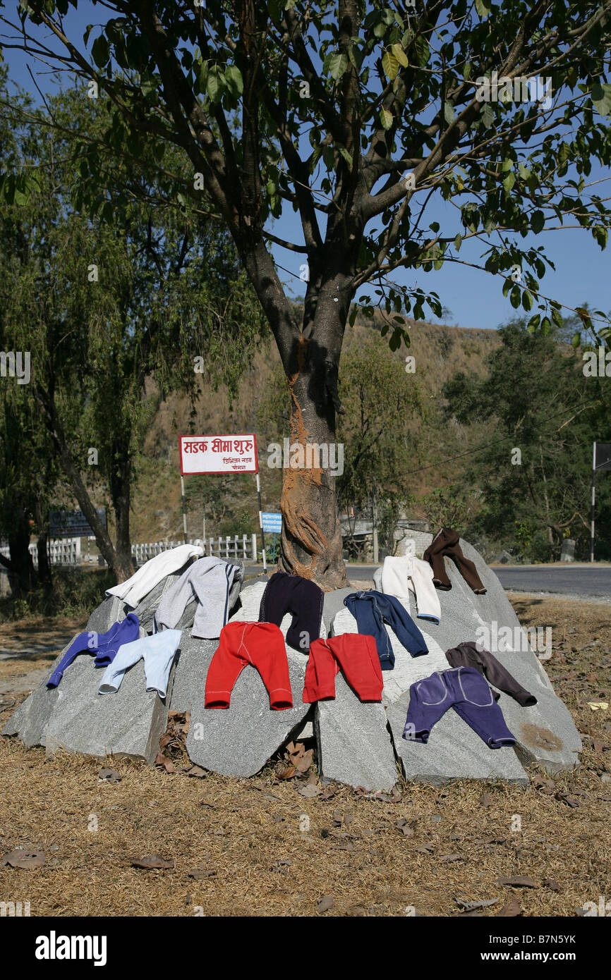 babys clothes drying on rocks Stock Photo - Alamy