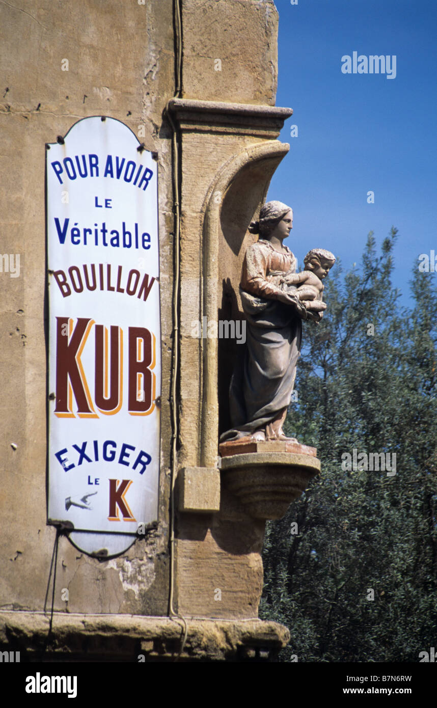 Old Metal Polish Advert and Madonna & Child, Aix-en-Provence, France Stock Photo