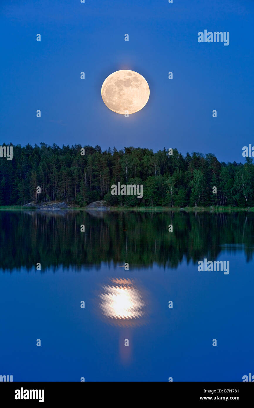 SWEDEN STOCKHOLM ARCHIPELAGO FULL MOON OVER WATER IN ARCHIPELAGO Stock ...