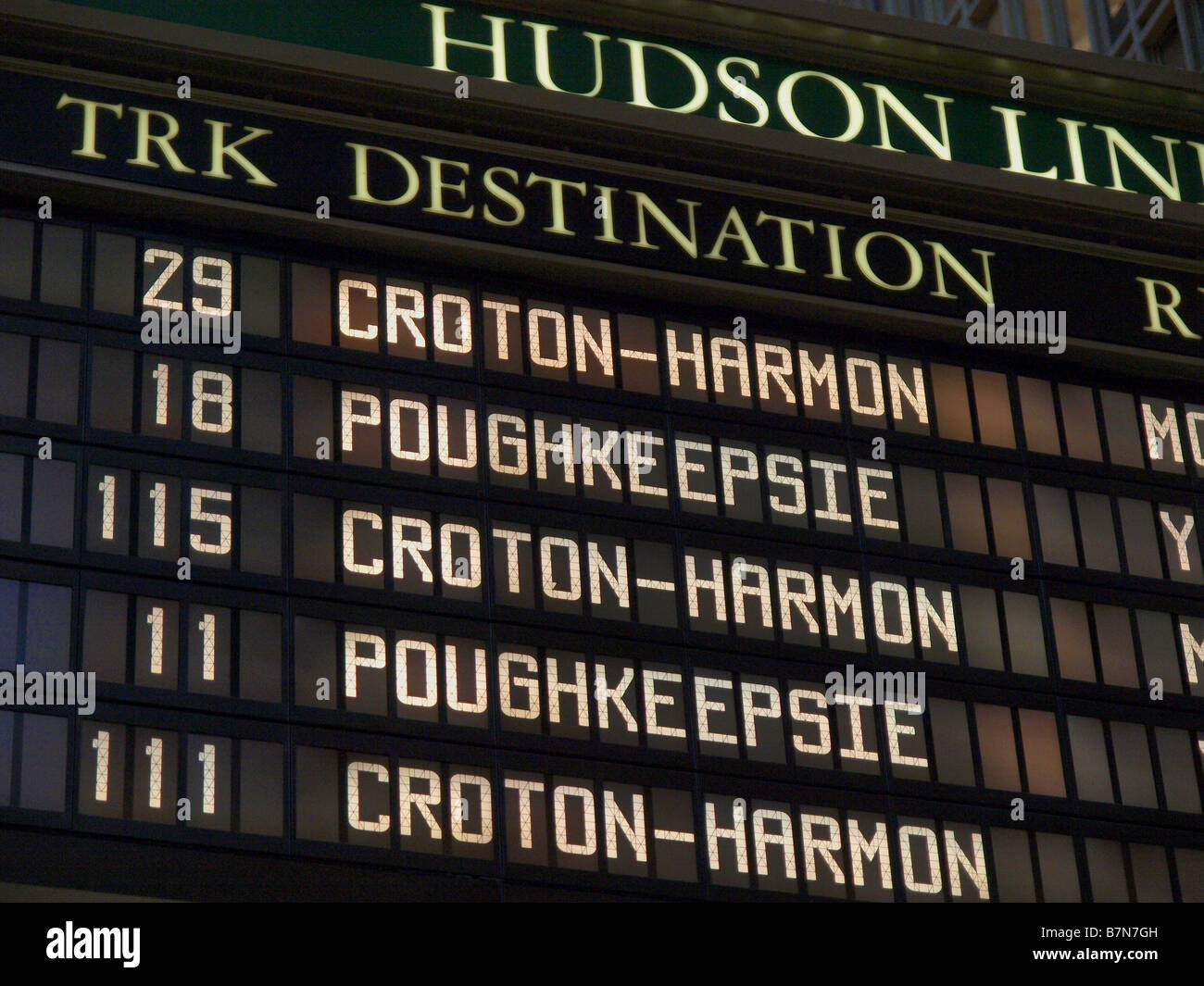 Train schedule on display on large sign in New York City's Union