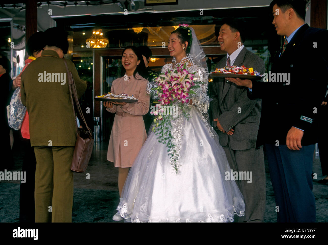 Chinese Bride And Groom Welcoming Guests Family Members Chinese