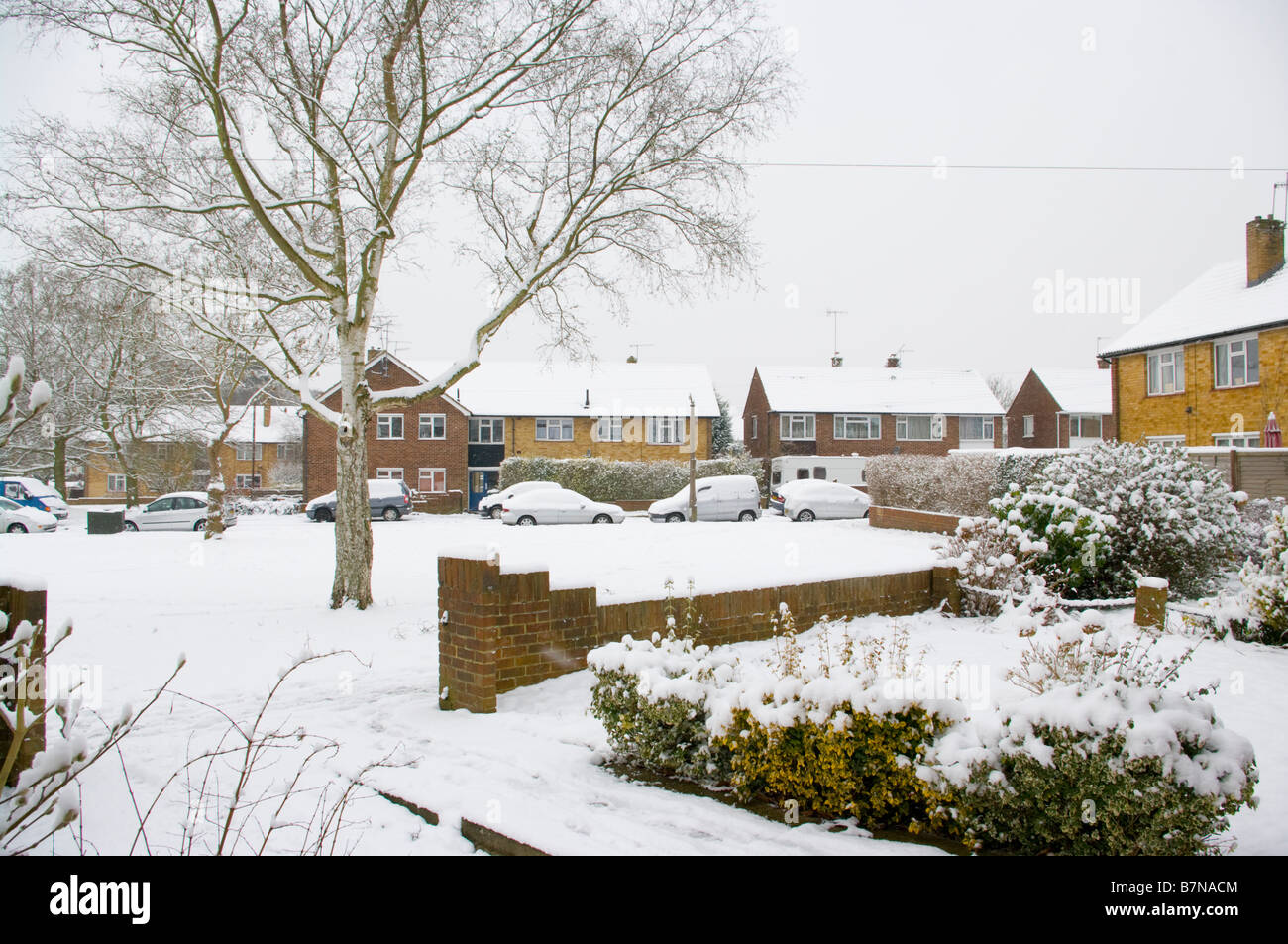 Residential Street Coneyberry in Reigate Surrey After a Heavy Snow Snowfall Winter suburban Street Scene Stock Photo