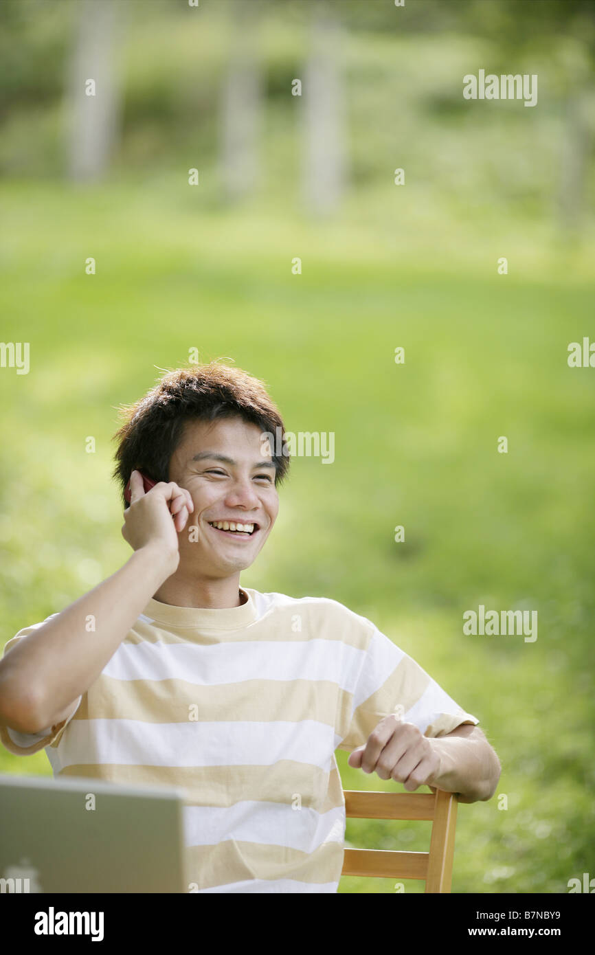 A man spaking by cell-phone Stock Photo