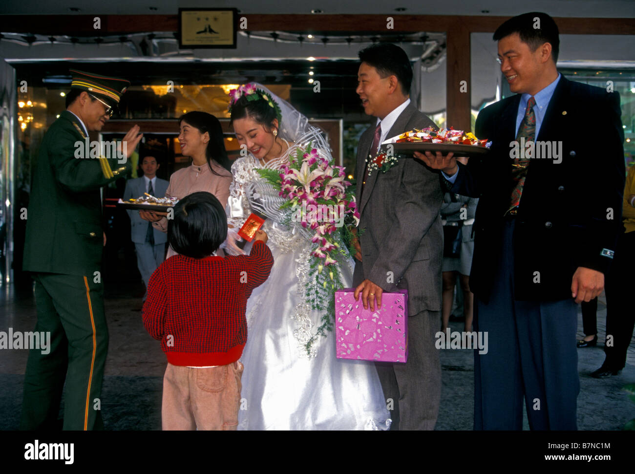 Chinese Bride And Groom Welcoming Guests Family Members Chinese