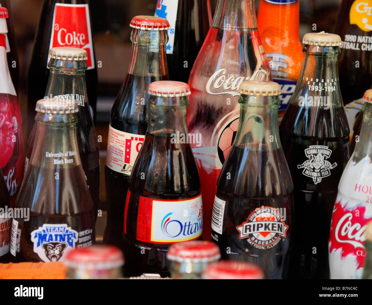 Classic CocaCola bottles on display in a window in New York City's