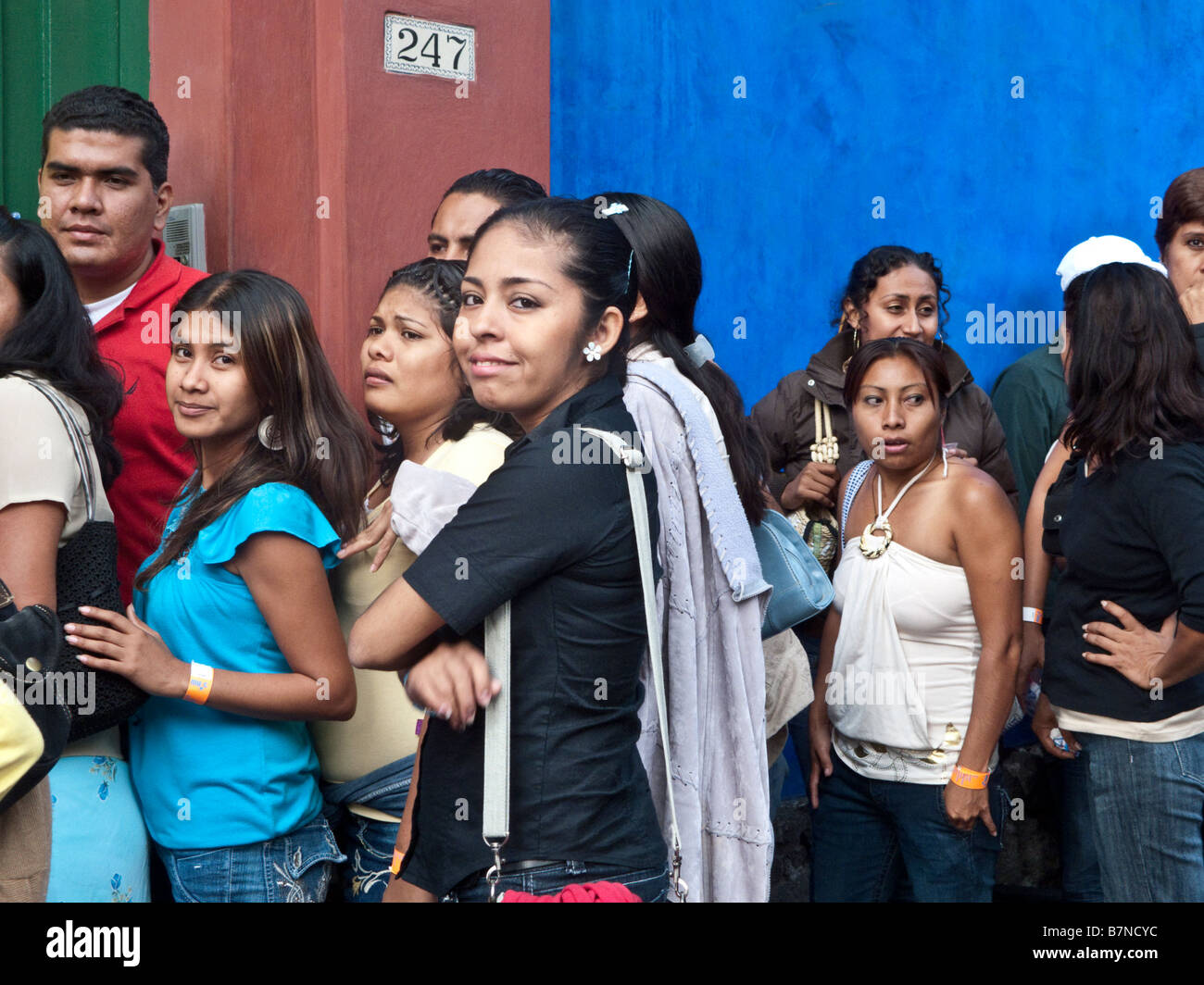 a good-natured crowd of young Mexicans waits to enter the Frida Kahlo museum 'Casa Azul' in the Coyoacan district, Mexico City Stock Photo