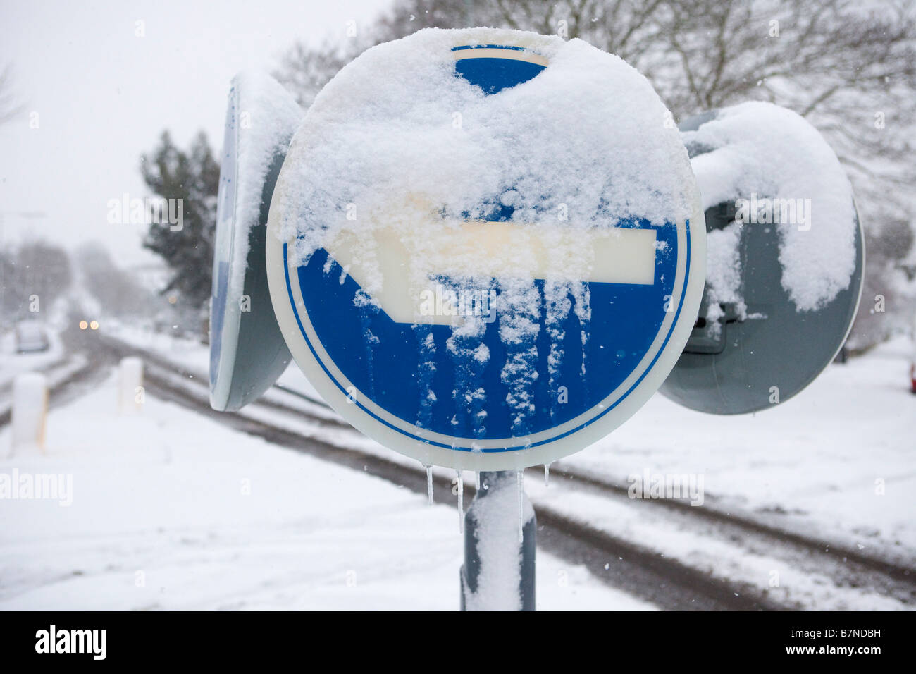 Snow and ice covers a traffic sign in Muswell Hill north London on the 2nd of February 2009 Stock Photo
