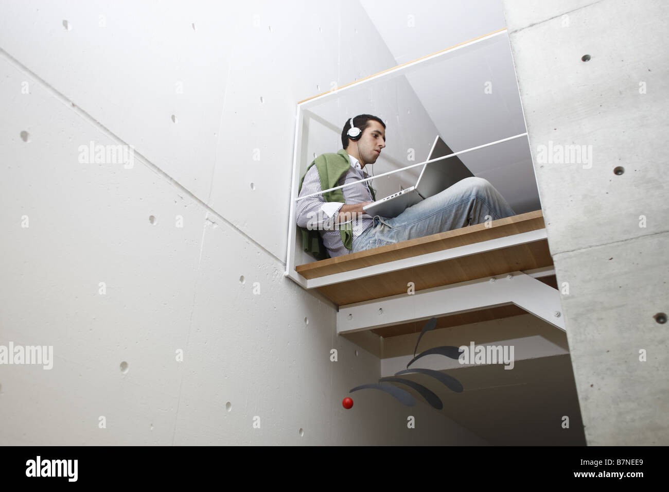 Man using a laptop Stock Photo - Alamy