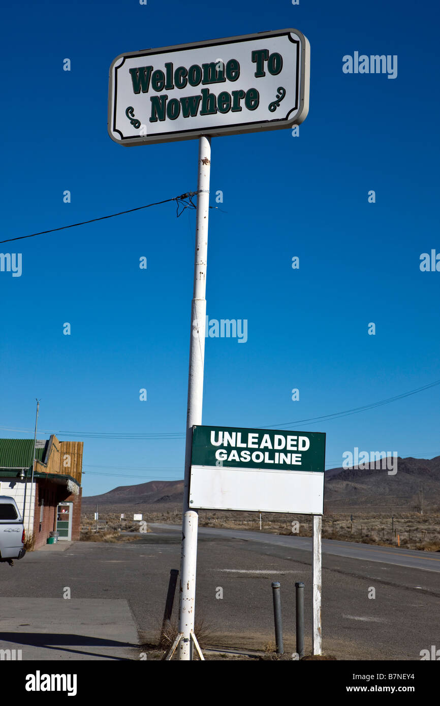 Sign at closed gas station reads Welcome to Nowhere off NV route 447 near Empire Nevada Stock Photo