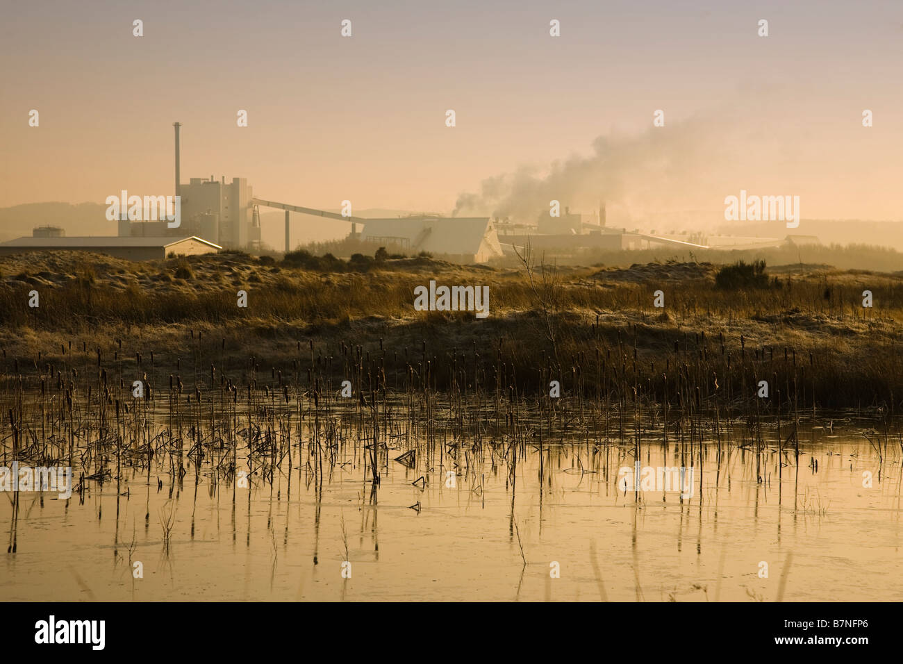 winter view of factory producing smoke from chimneys Stock Photo - Alamy