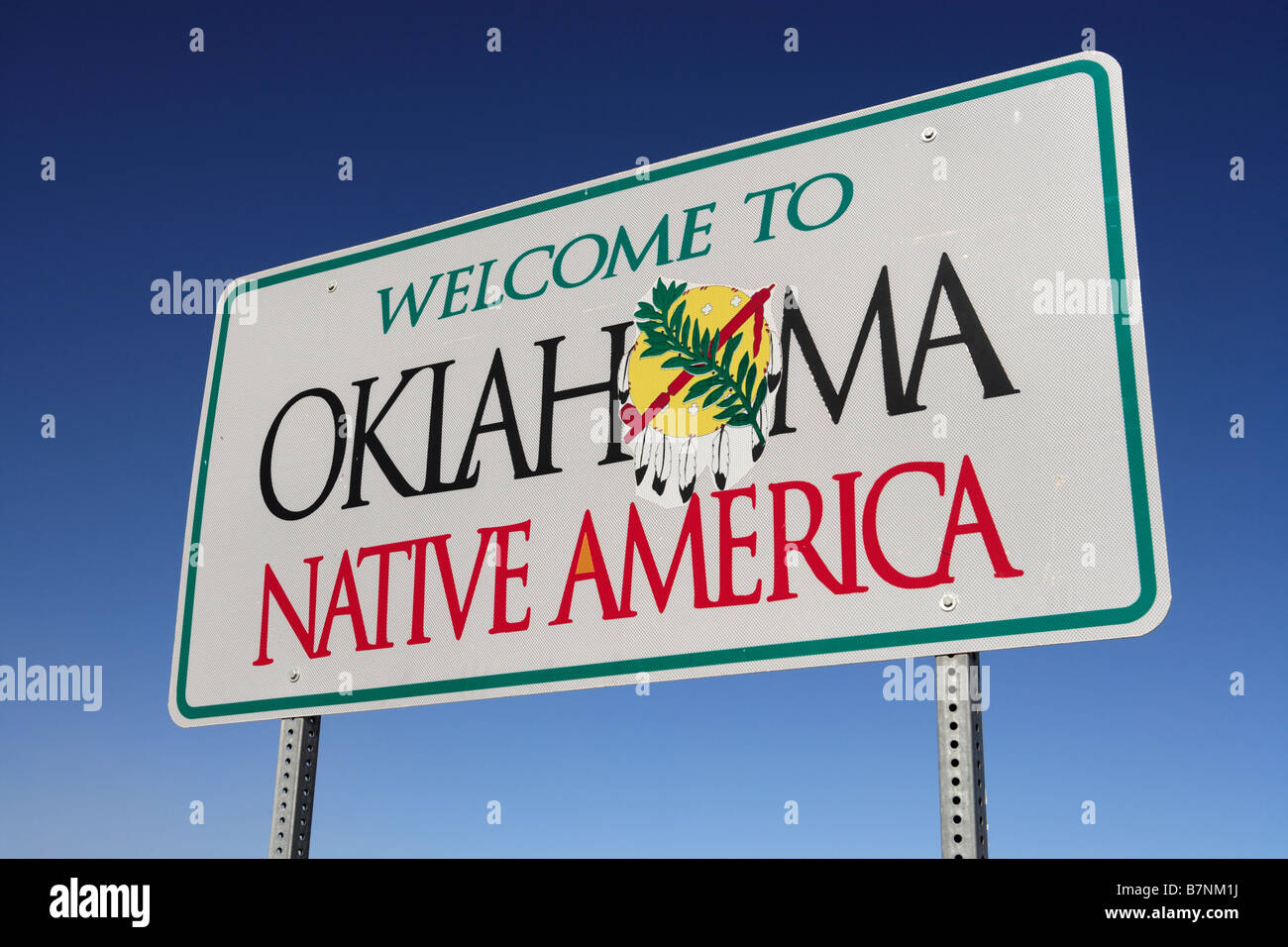 A welcome sign at the Texas/Oklahoma border:  'Welcome to Oklahoma Native America.' Stock Photo