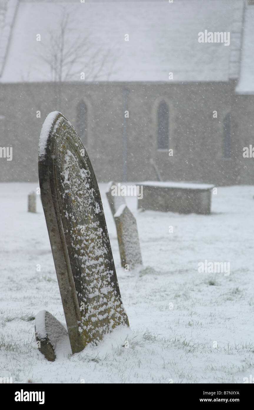 Graveyard in winter Stock Photo