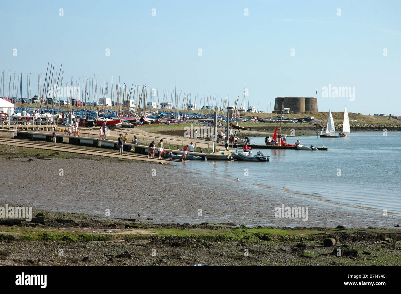River Alde at  Aldeburgh yacht club looking towards the Martello tower on the Suffolk coast Stock Photo