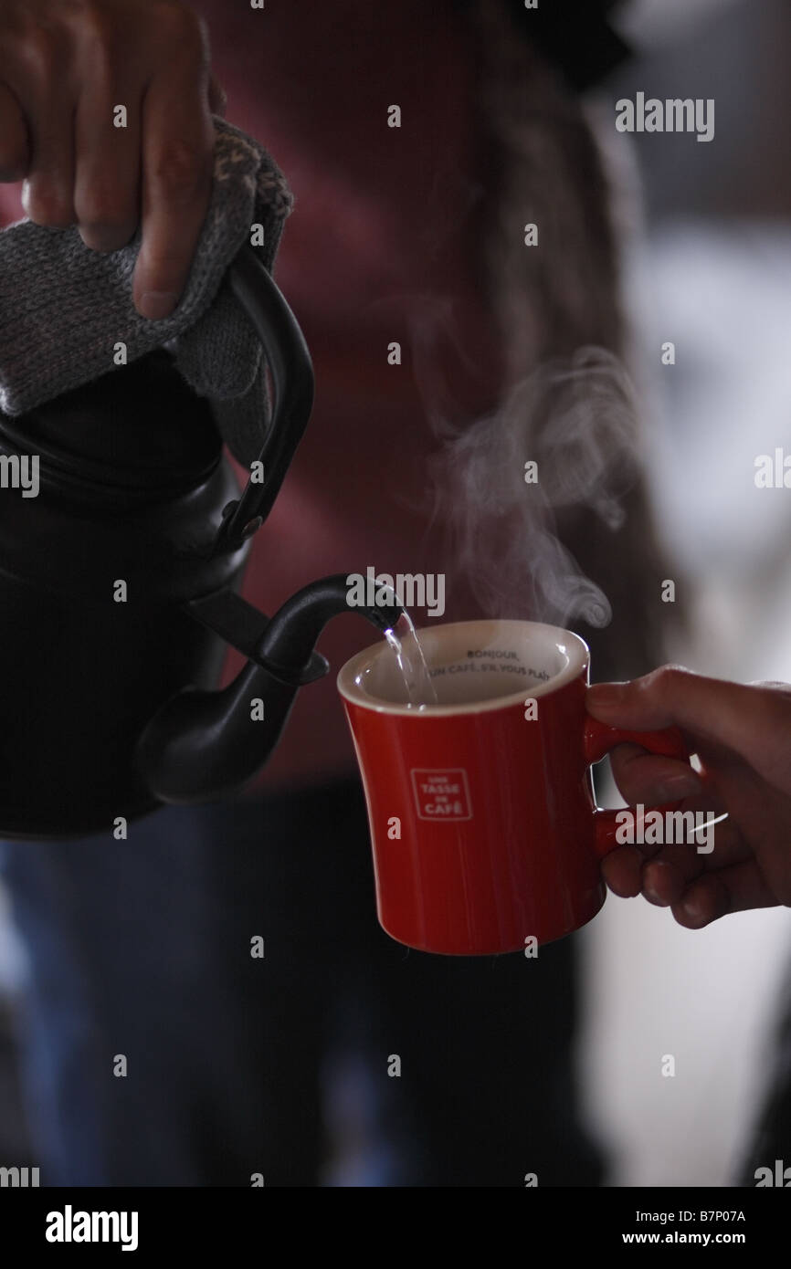 Pouring hot water Stock Photo Alamy