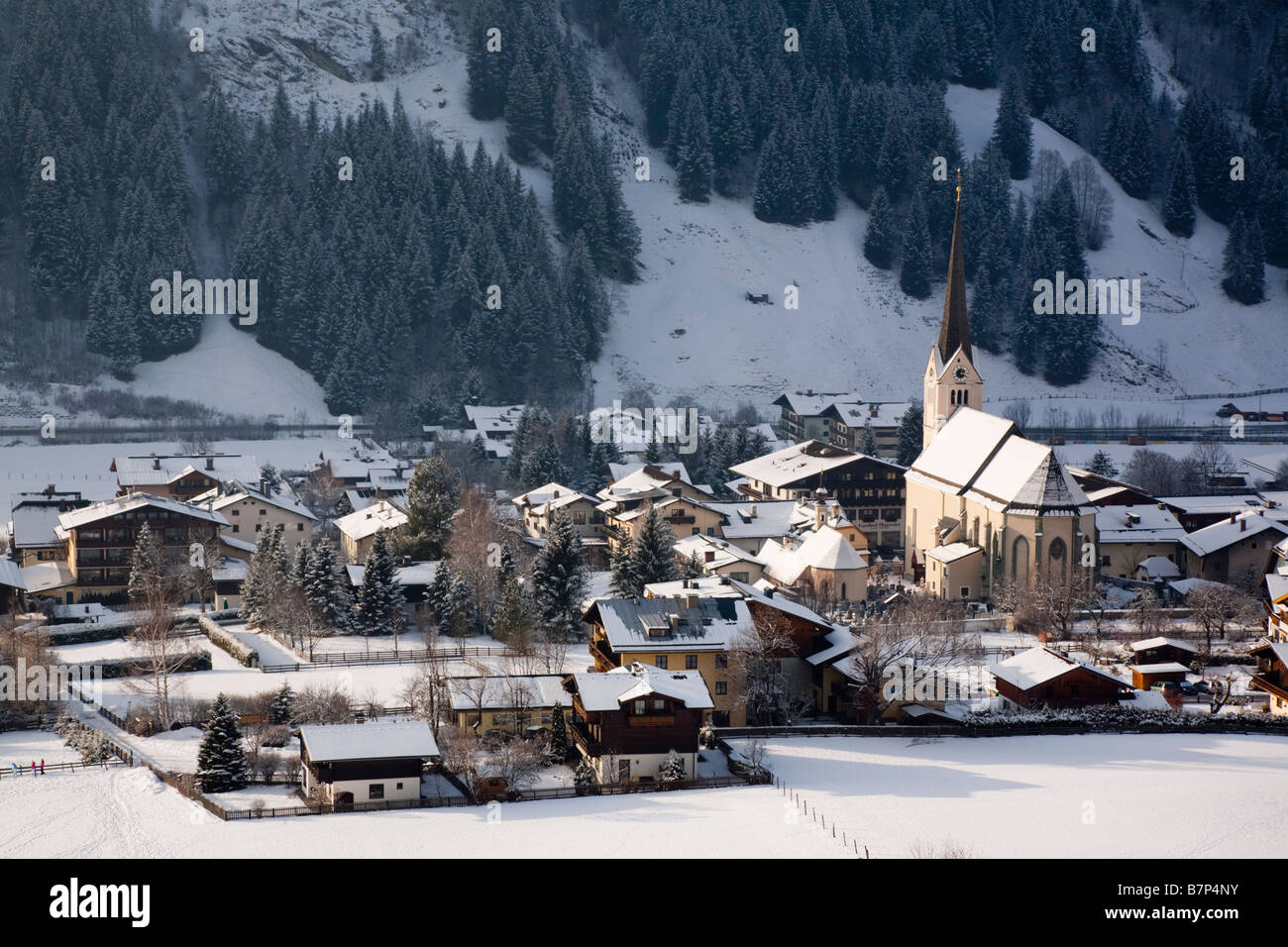 Rauris Austria Europe Alpine village and church in Austrian Alps with snow in Rauriser Sonnen Valley in winter Stock Photo