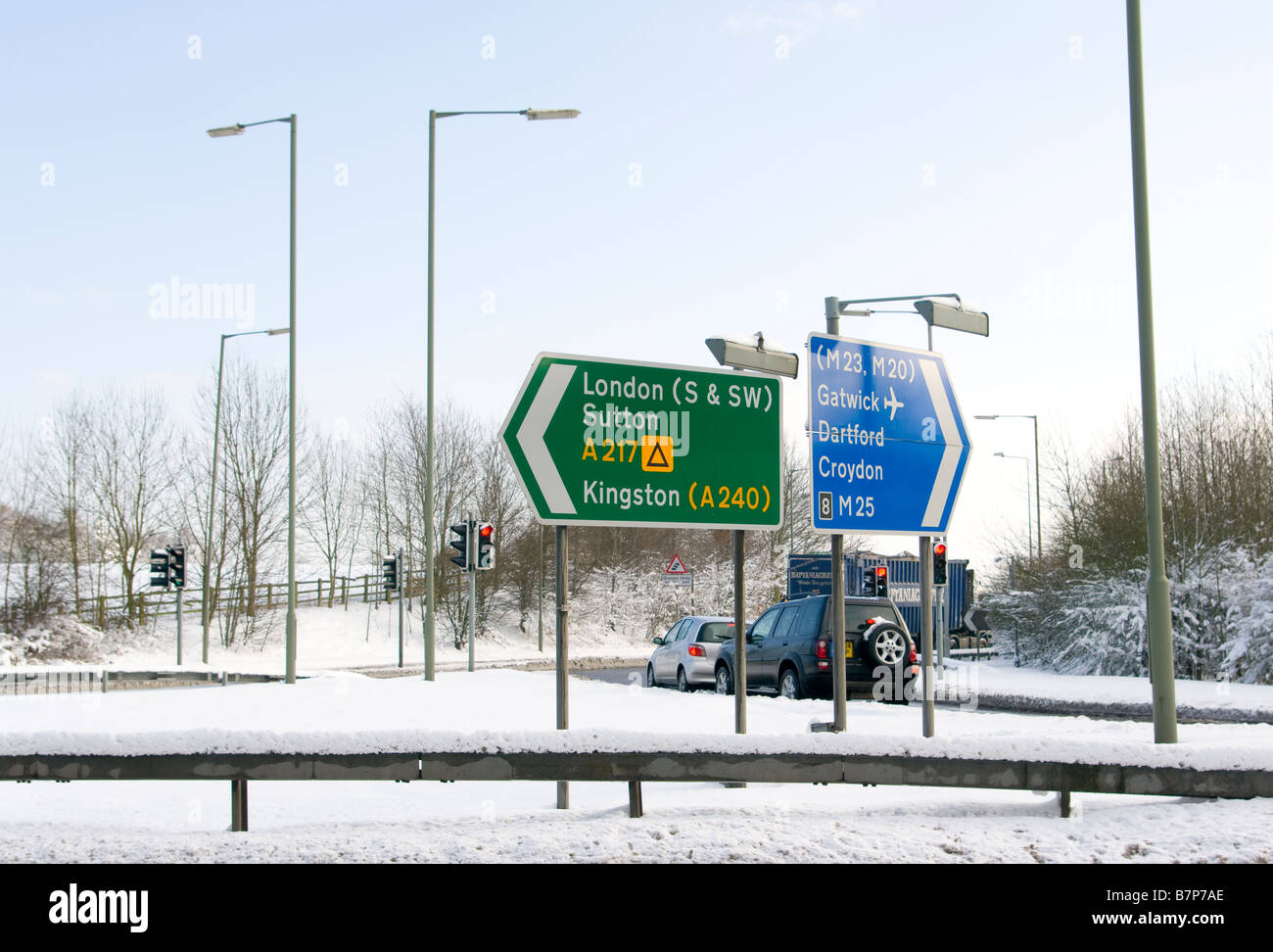 Road Signs In The Snow at Junction 8 M25 A217 uk motorway traffic road sign signs roadsigns Stock Photo