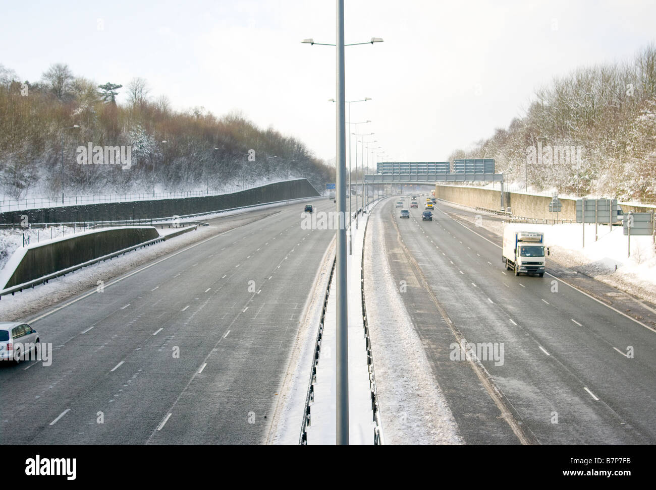 Free Flowing and Nearly Empty M25 motorway After Gritting cleared of snow gritted Looking West from Junction 8 in Surrey Stock Photo