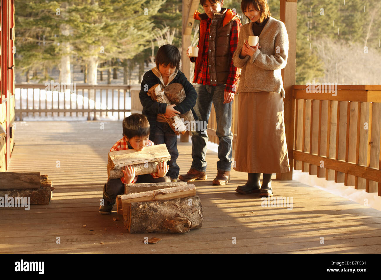 Children carrying firewood hi-res stock photography and images - Alamy