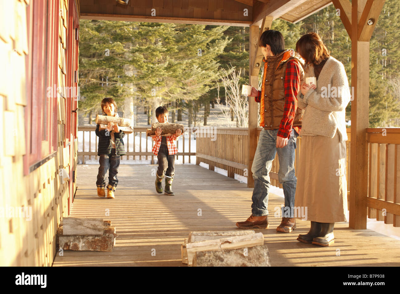 Children carrying firewood hi-res stock photography and images - Alamy
