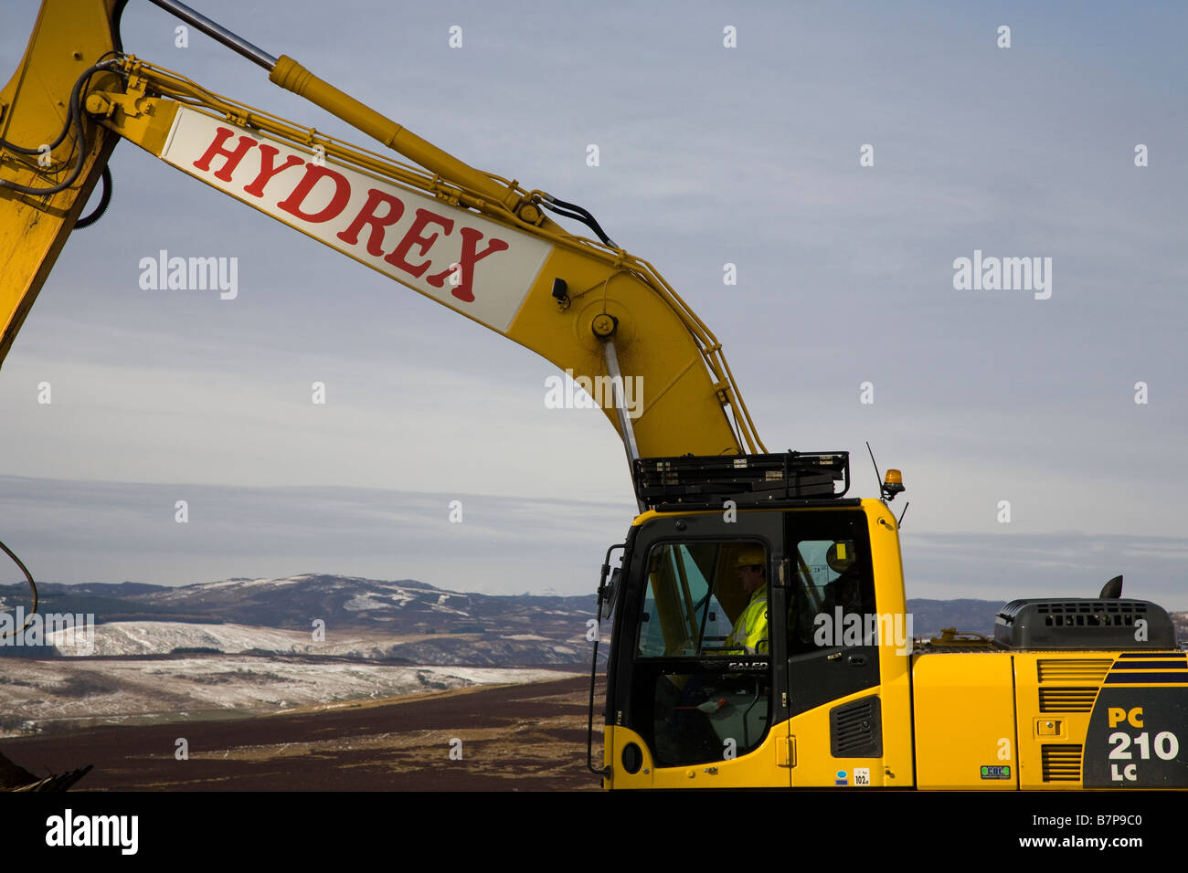 Giant excavator a Hydrex De-Stoner JCB Type vehicle at Alyth Windfarm, Blairgowrie Scotland uk Stock Photo