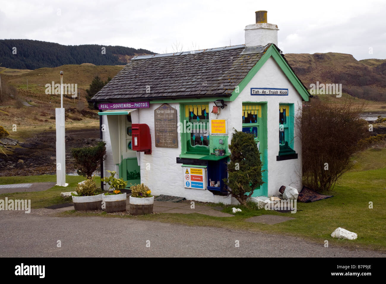 Clachan-Seil: petrol pump, gift shop and postbox № PA34 151 A small gift shop by the Atlantic Bridge,with a filling station and postbox. Stock Photo