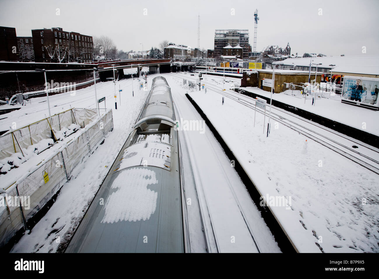 Snow And Train At Clapham Junction Station Stock Photo