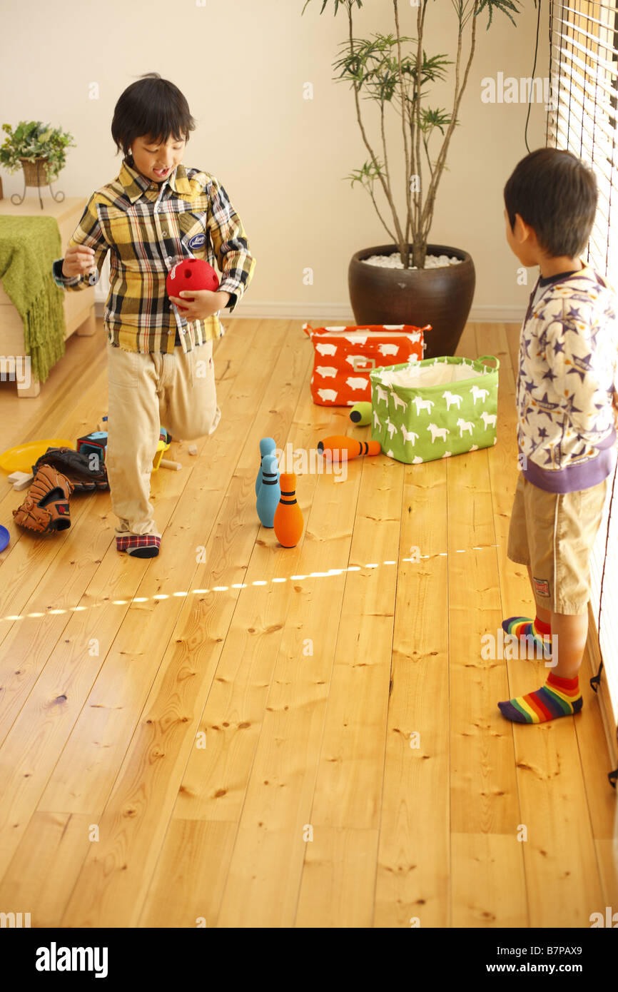 Brothers putting away Stock Photo