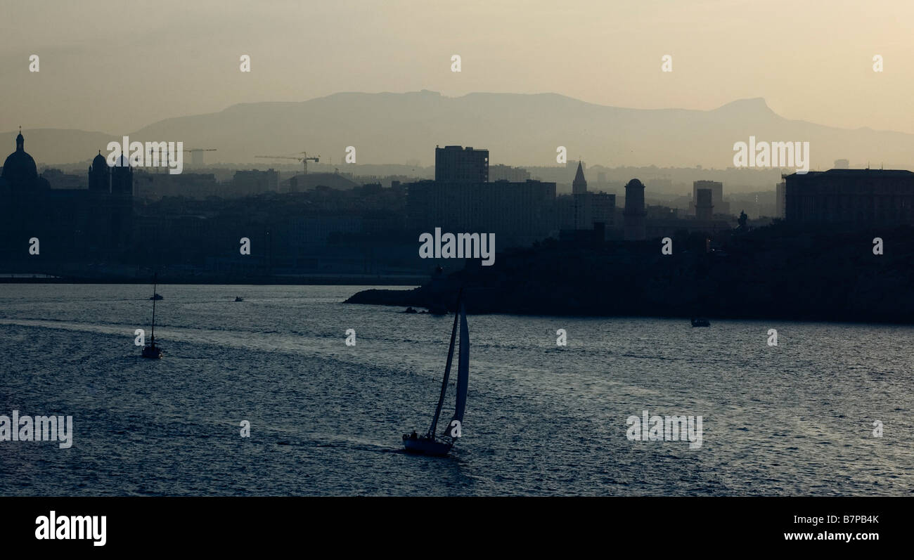 Marseille port seen from outside at sunrise. Stock Photo