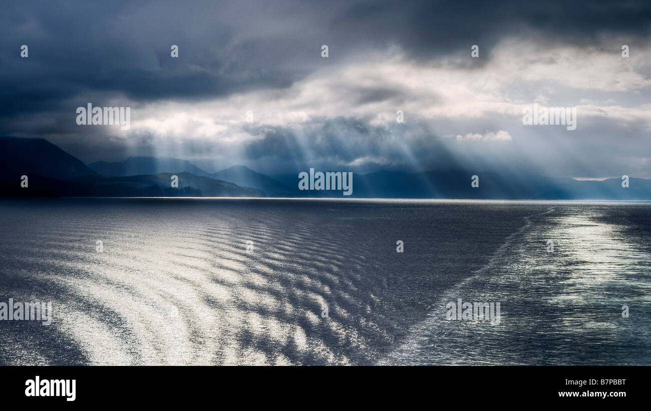 Reflections of morning light on the trail of the Alaska Marine Highway boat, on the inside passage Stock Photo