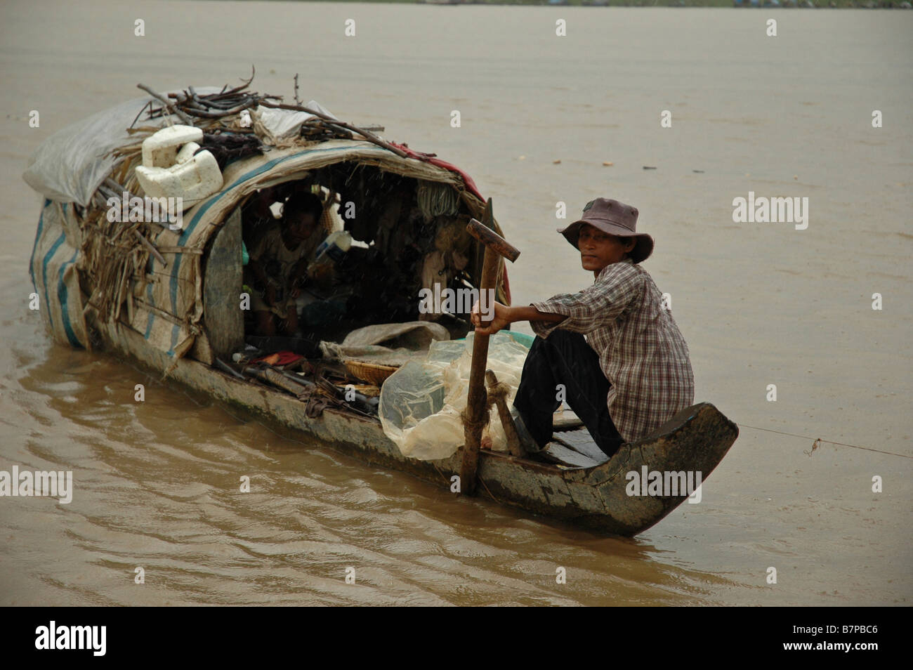 Fisherman on the Mekong Stock Photo - Alamy